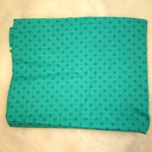 FABRIC Small navy simple flowers regularly spaced on teal background JoA…